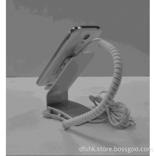 retail automation system that secure and charge mobile phone